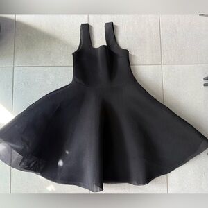 Valentino Black Dress
Doesn’t have a tag
But fits size 2-4 US